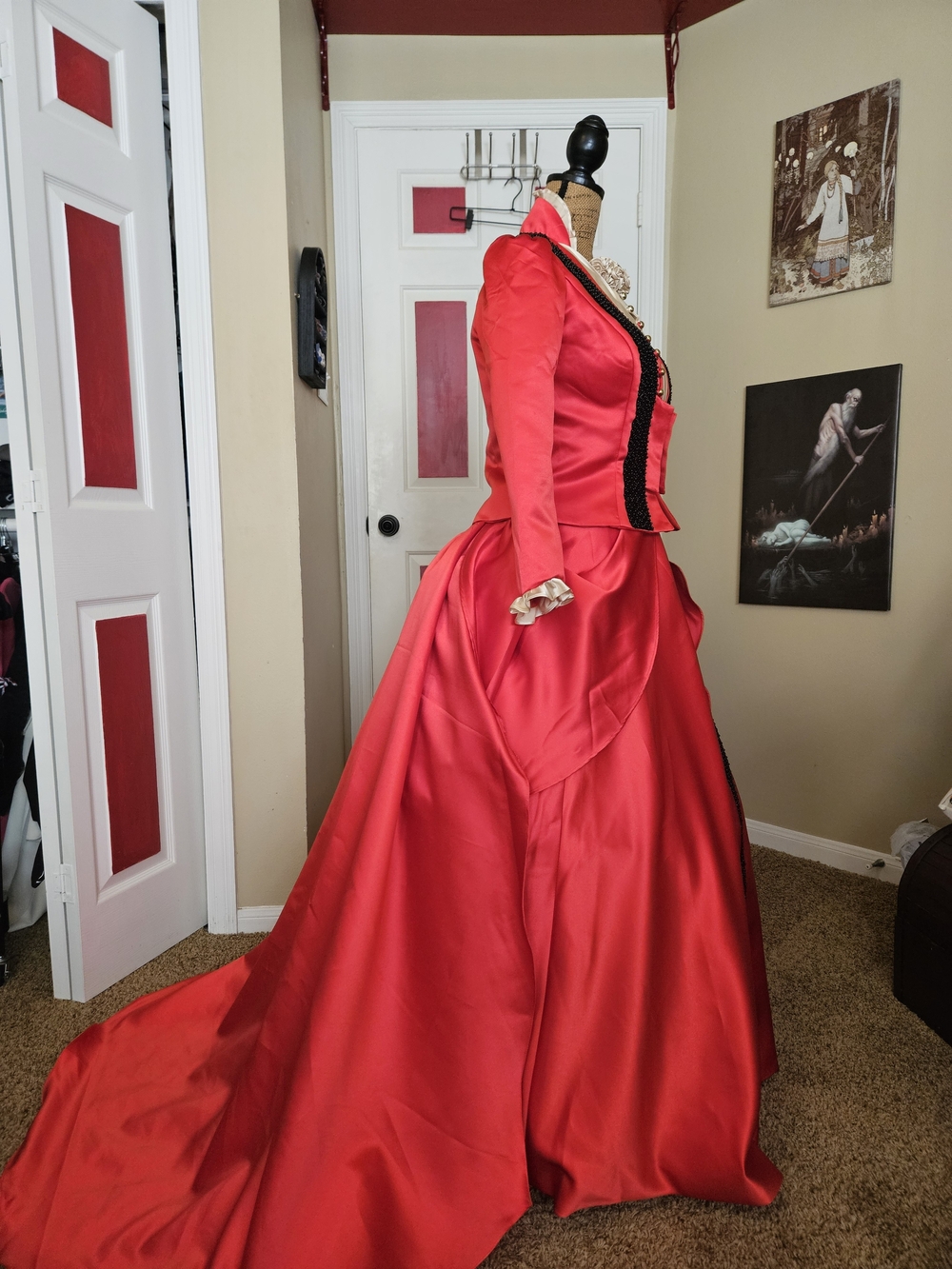 Red Victorian-Style Satin Ball Gown with Black Trim